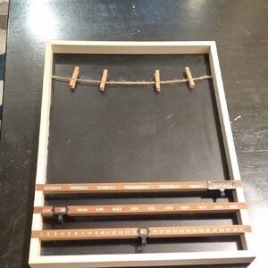 chalk board with clips and perpetual calandar
